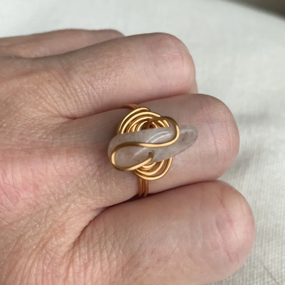 64 Milky Quartz gold toned wire wrapped ring